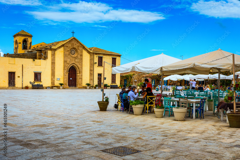 The picturesque village of Marzamemi, in the province of Syracuse, Sicily. Square of Marzamemi, a small fishing village, Siracusa province, Sicily, italy, Europe.