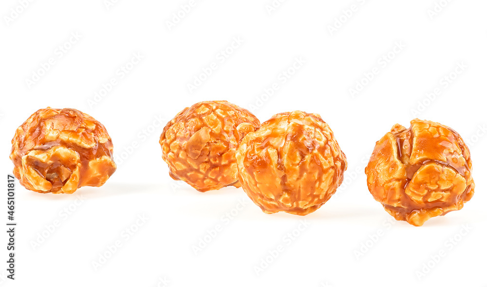 Delicious caramel popcorn isolated on a white background. Creme caramel popcorn. Delicious caramel popcorn isolated on a white background. Creme caramel popcorn.