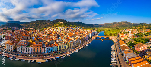 Beautiful view of Bosa town, Sardinia island, Italy. Travel destination. Bosa town with Ponte Vecchio bridge across the Temo river. Marvelous morning view of Sardinia island, Italy, Europe.