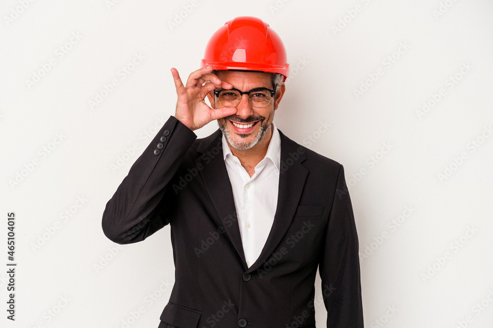 Middle age architect caucasian man isolated on white background excited keeping ok gesture on eye. Middle age architect caucasian man isolated on white background excited keeping ok gesture on eye.