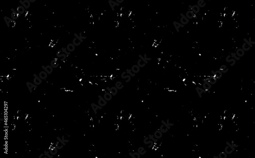 Monochromatic black and white illustration of shards, pieces, stars or particles in deep dark space. Great as texture, pattern or background. Artistic expressive digital representation of empty space.
