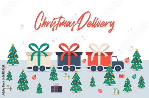 Christmas Delivery long truck with gift box. Free shipping vector illustration. Isolated delivery van with red bow. Gift box on truck.Flat vector illustration with copy space