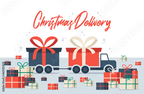 Christmas Delivery long truck with gift box. Free shipping vector illustration. Isolated delivery van with red bow. Gift box on truck.Flat vector illustration with copy space
