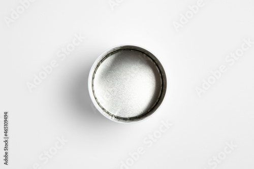 Metal storage jar with bamboo lid isolated on white background.High-resolution photo.