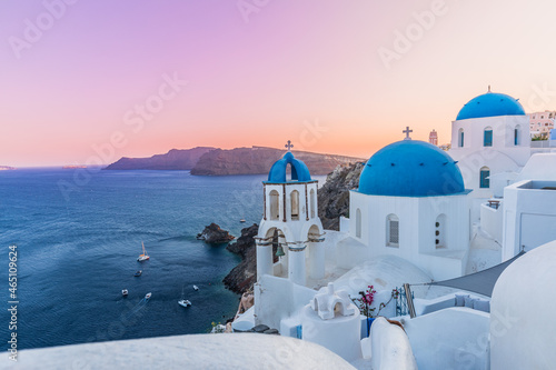 Greek island of Santorini. Amazing travel panorama, white houses, stairs and flowers on the streets. Idyllic summer vacation, urban landscape, tourism destination scenic. Oia, Thira panoramic views