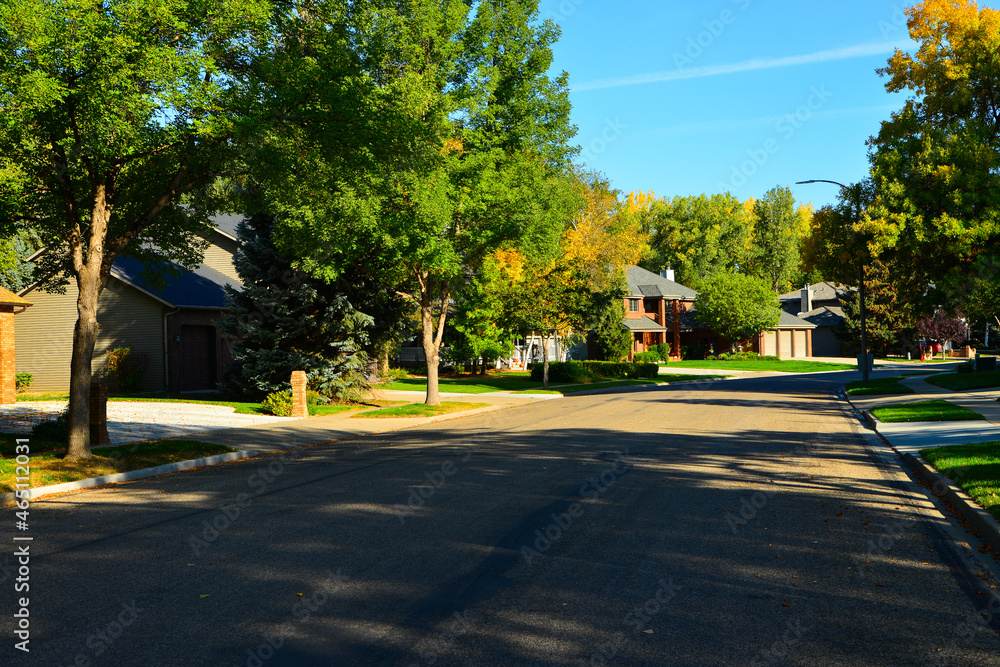 Modern homes line the streets of this comfortable clean neighborhood in growing Bismarck, North Dakota.