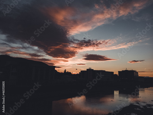sunset over the city and the river 