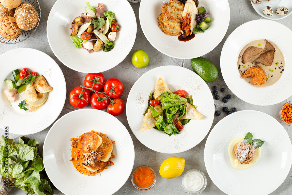 dinner concept. table with food top view many dish with ingredients on concrete background. light concrete background. summer food selection dinner concept. table with food top view many dish with ingredients on concrete background. light concrete background. summer food selection