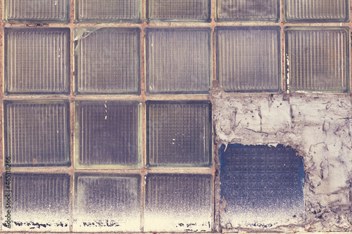 Background of old broken square windows, glass tiles