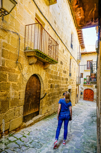 woman enjoying a walk through the town of Sos del Rey Catolico