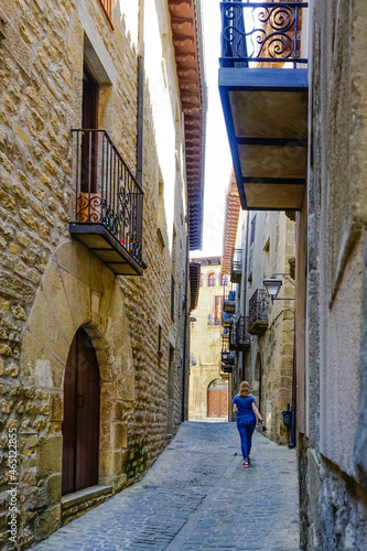 woman enjoying a walk through the town of Sos del Rey Catolico © cribea