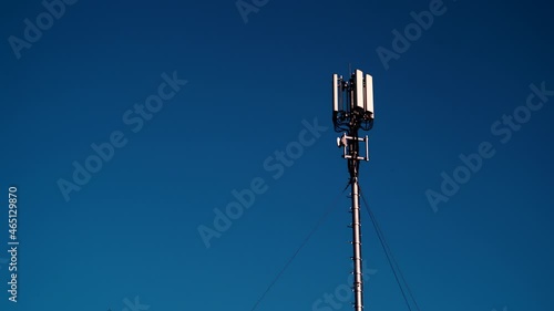 Mobile telephone radio network antenna 4G or 5G on telecommunication mast against sky. New technology generation. Radiation, human health issues.