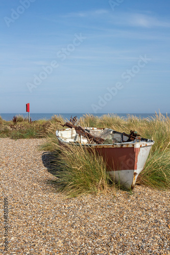 Schilderij op canvas Old fishing boat on Kessingland Beach, Suffolk, England