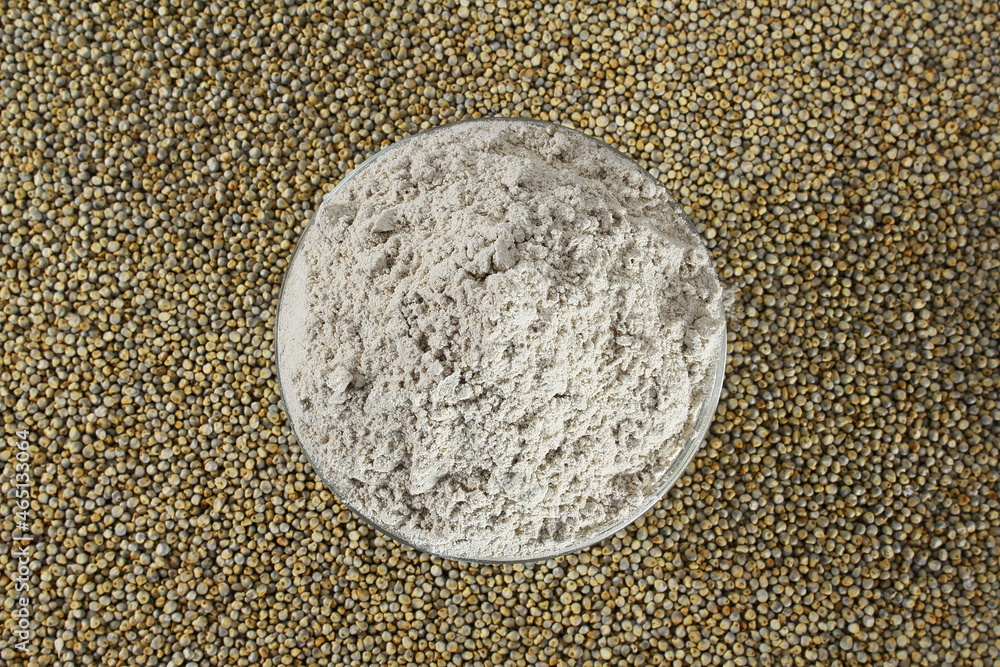 pearl millet grain whole and flour in bowl for indian gujarati food