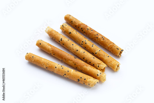 Crispy egg rolls on white background.