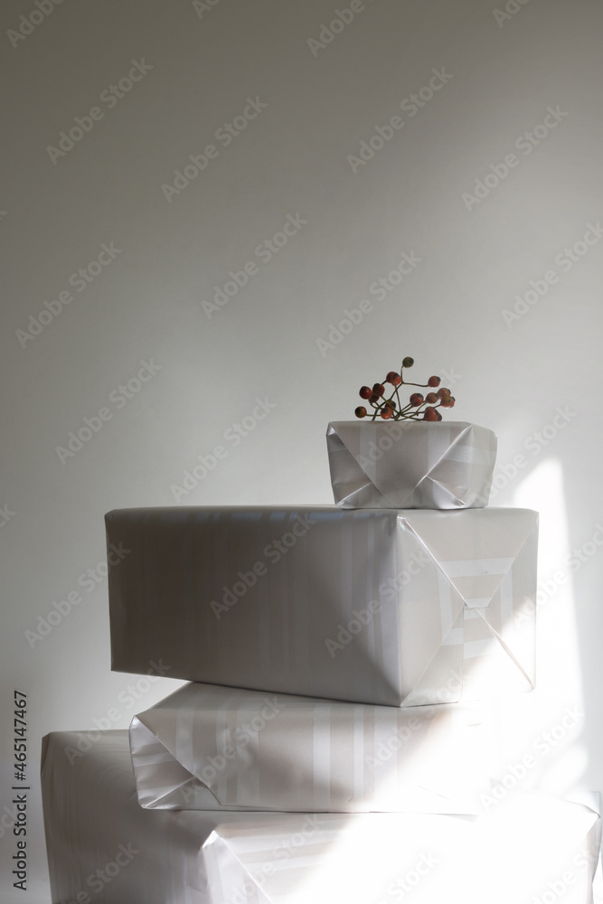 Stacked gifts illuminated with natural light Stacked gifts illuminated with natural light