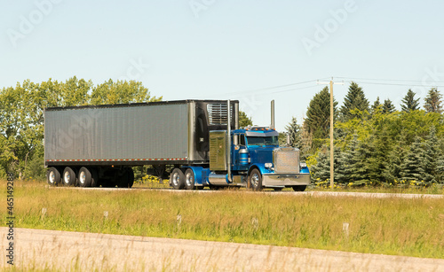 Heavy Cargo on the Road. A truck hauling freight along a highway