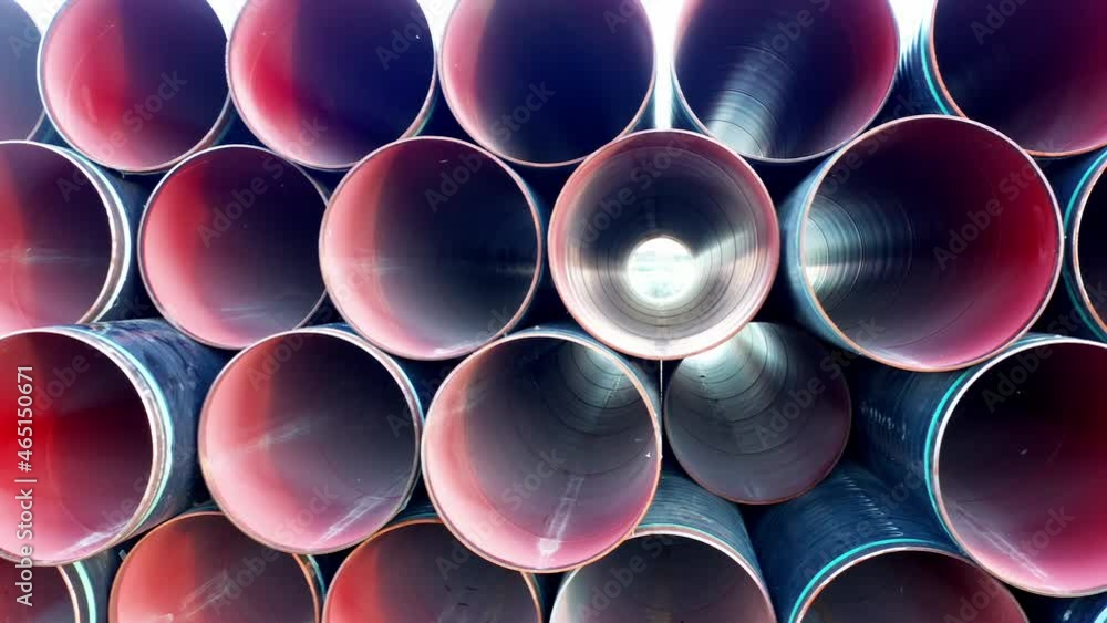 Stack of pipes for sewage or water supply system plumbing. Plastic or PVC or polythene tubes used for construction and installation of industrial drainage or distribution pipelines or sanitary sewer. Stack of pipes for sewage or water supply system plumbing. Plastic or PVC or polythene tubes used for construction and installation of industrial drainage or distribution pipelines or sanitary sewer.