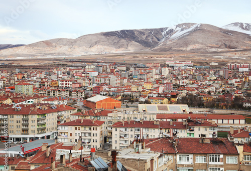 Nigde city panorama from Nigde Castle in Central Anatolia, Turkey. Niğde is a city and the capital of Niğde Province in the Central Anatolia region of Turkey at an elevation of 1,299 mt. photo