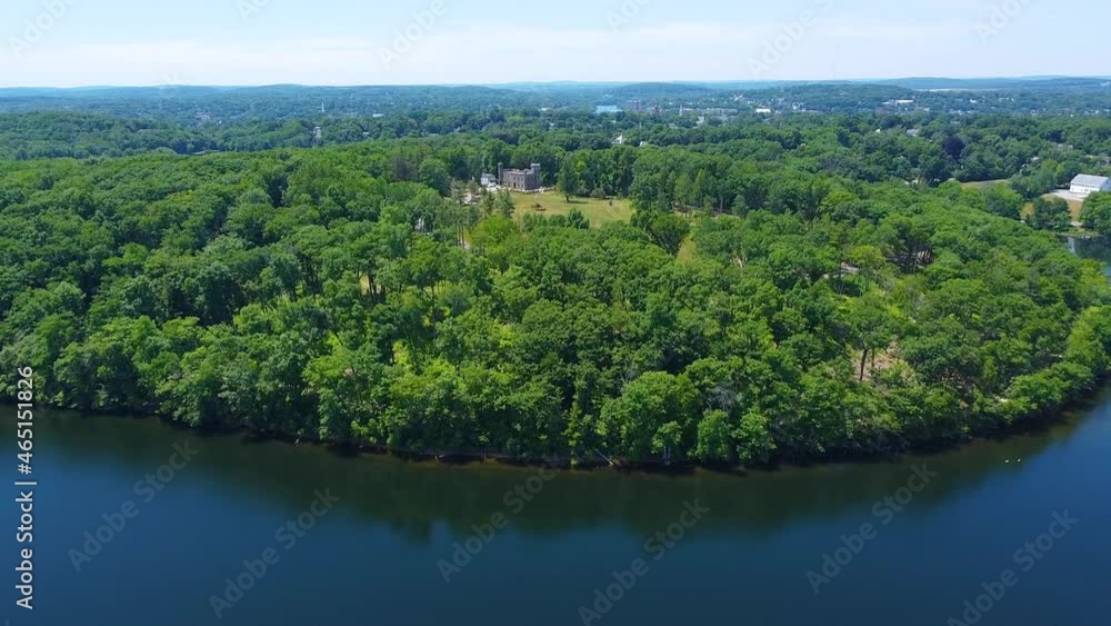 Winnekenni Castle at Winnekenni Park aerial view from Kenoza Lake in city of Haverhill, Massachusetts MA, USA. This castle was built in 1873. Winnekenni Castle at Winnekenni Park aerial view from Kenoza Lake in city of Haverhill, Massachusetts MA, USA. This castle was built in 1873.