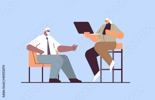 senior businesspeople discussing during meeting mix race business man woman couple in formal wear working together