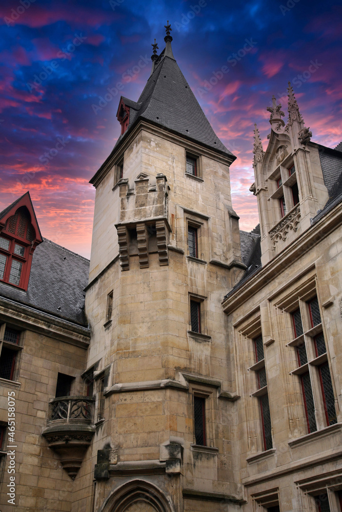 Ancient gothic style house or chateau, close up of tower and windows