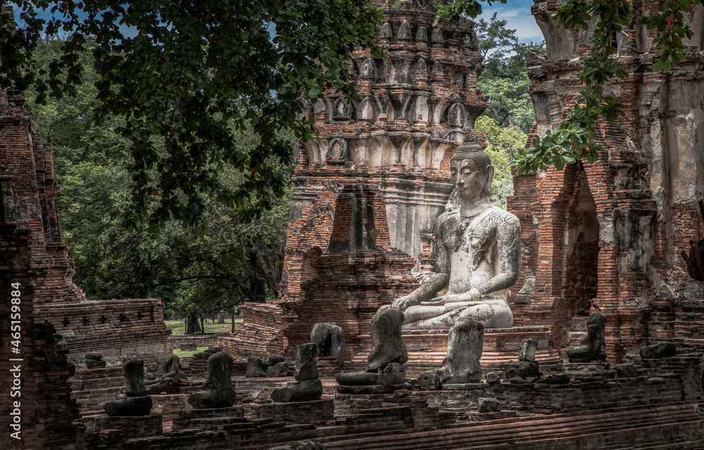 Aytthaya, Thailand, 22 Aug 2020 : Ancient buddha statue at Wat phra mahathat. Ayutthaya province in Thailand. Selective focus. Aytthaya, Thailand, 22 Aug 2020 : Ancient buddha statue at Wat phra mahathat. Ayutthaya province in Thailand. Selective focus.