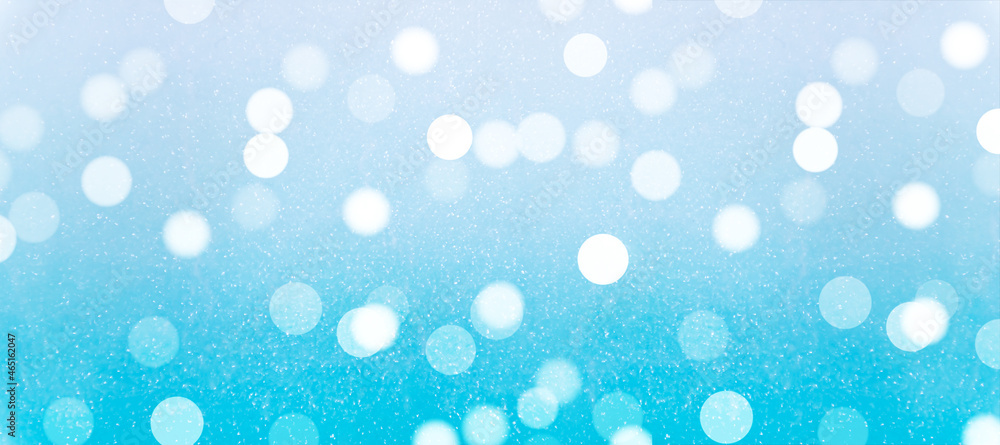 Festive blue background. Unfocused background with blurred bokeh. Festive blue background. Unfocused background with blurred bokeh.