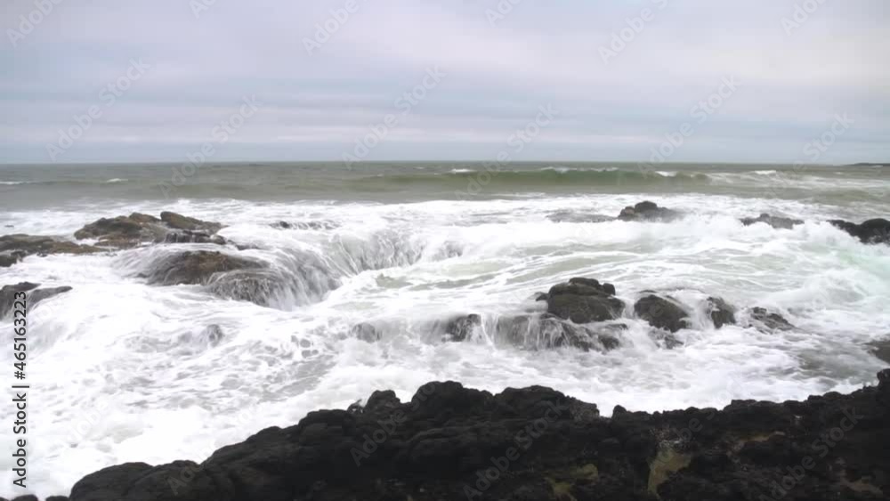 The magnificent Thors Well during a rough and stormy sea at high tide on the Oregon Coast. The magnificent Thors Well during a rough and stormy sea at high tide on the Oregon Coast.