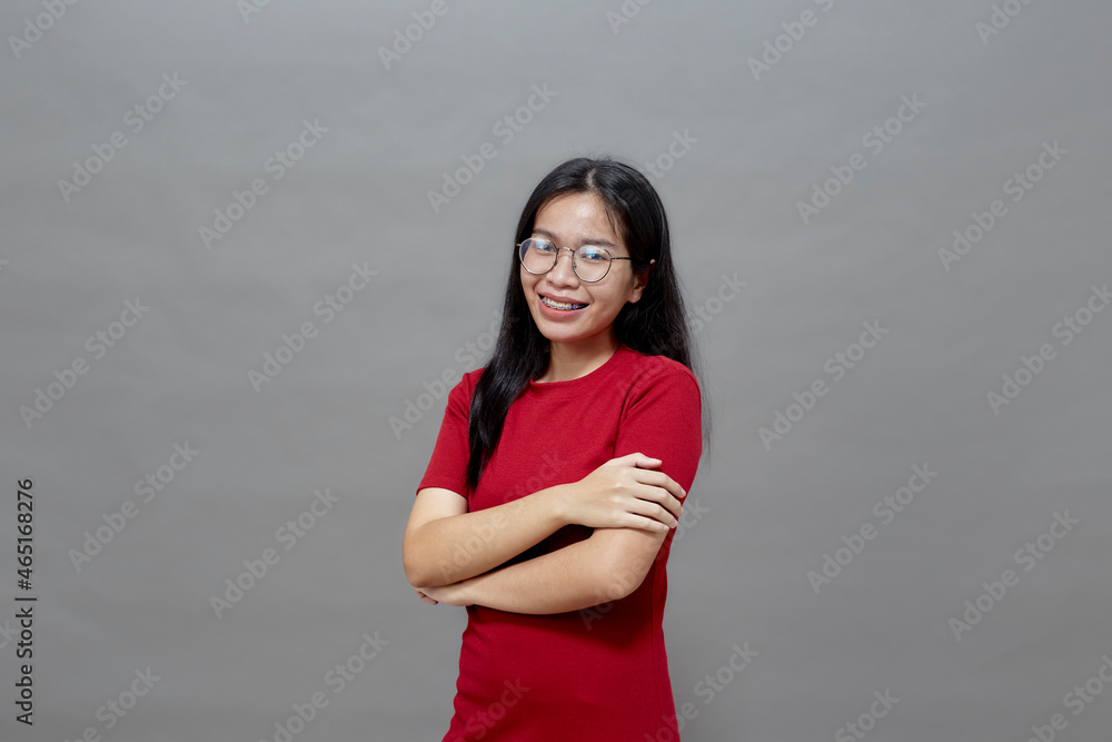 Asian woman brunette in a red dress cross arms Asian woman brunette in a red dress cross arms