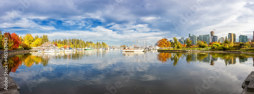 Panoramic View of Stanley Park in Coal Harbour, Downtown Vancouver, British Columbia, Canada. Fall Season Colors. Marina in Urban Modern City. photo