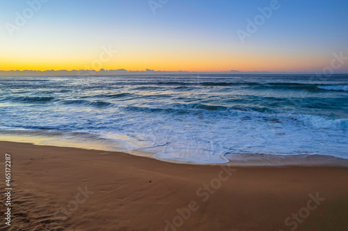 Surfs up aerial sunrise seascape © Merrillie