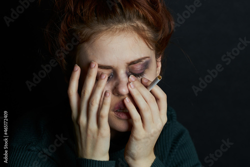 Wallpaper Mural woman with fingal capital smokes a cigarette depression abuse Torontodigital.ca