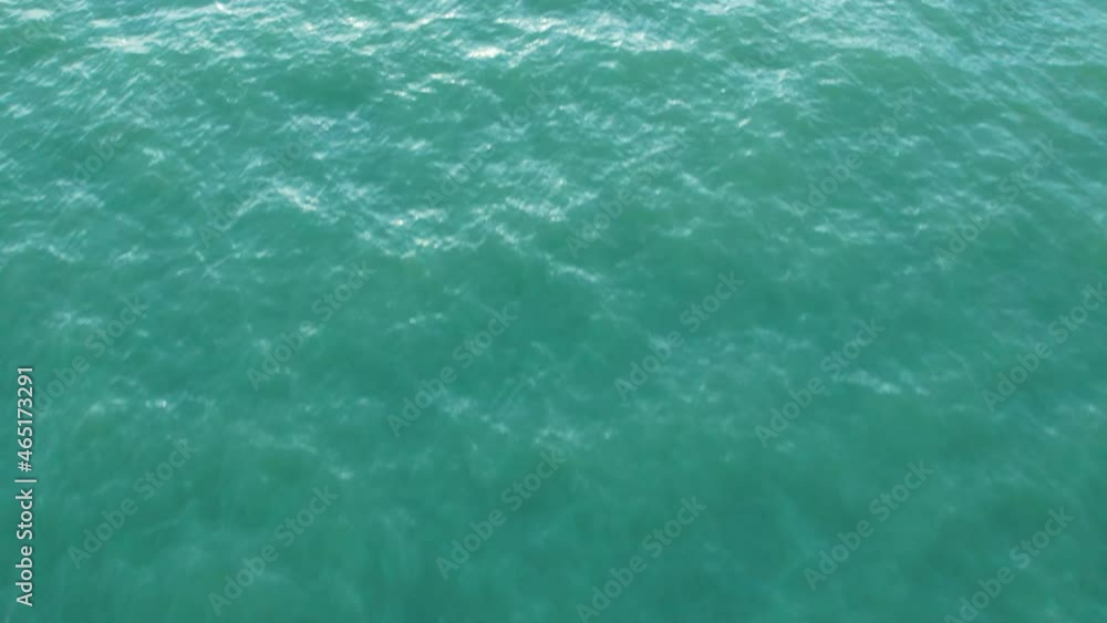 4K aerial drone view of beautiful sea waves, Flight over sea. Small waves on sea. Cinematic drone shot.
4K aerial drone view of beautiful sea waves, Flight over sea. Small waves on sea. Cinematic drone shot.