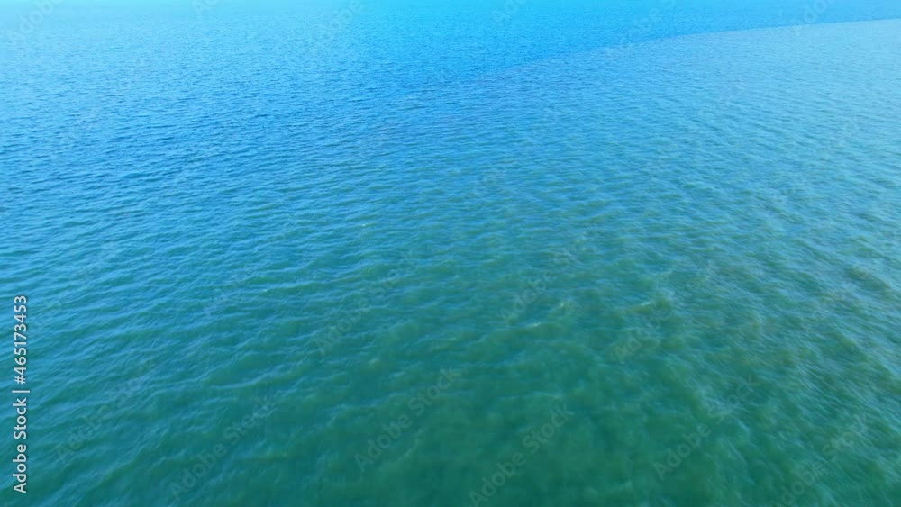 4K aerial drone view of beautiful sea waves, Flight over sea. Small waves on sea. Cinematic drone shot.
4K aerial drone view of beautiful sea waves, Flight over sea. Small waves on sea. Cinematic drone shot.