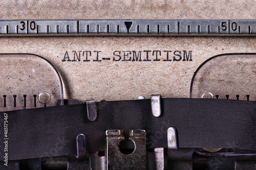 Tableau sur toile The inscription Antisemitism written on a gray sheet with a typewriter font