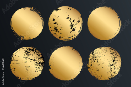 Set of gold circles, grunge, grain, dirty brush strokes. Grungy effect, golden creative elements for your design. Vector illustration.
