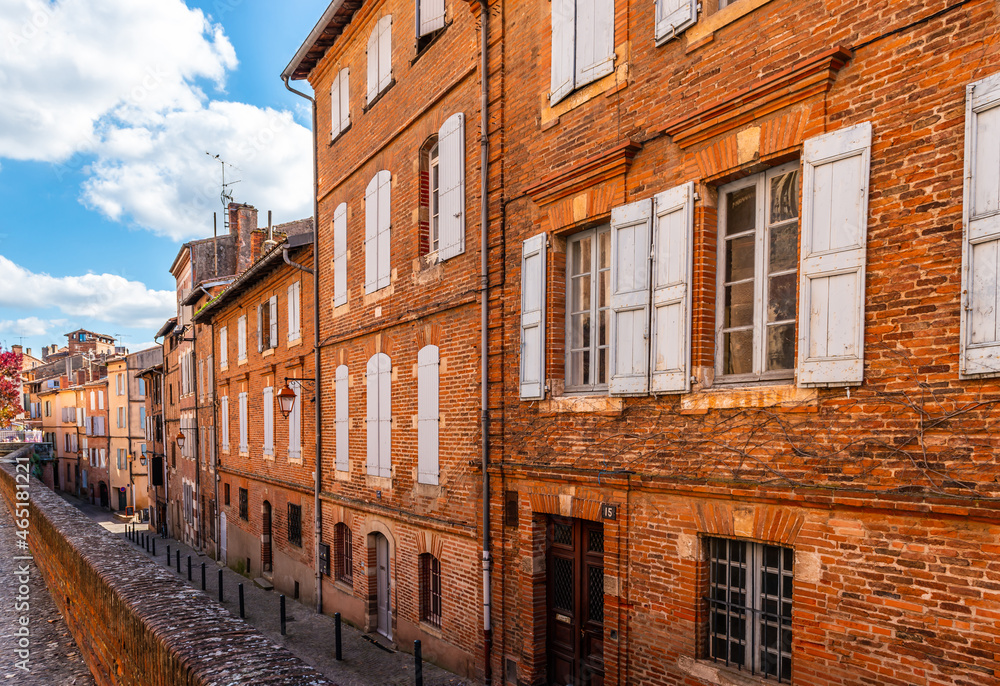 Rue Caminade and its facades of old houses, facing the Sainte Cécile cathedral in Albi, in the Tarn region, in Occitanie, France