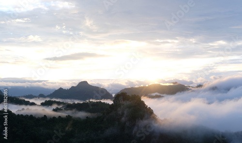 Beautiful mountain sunrise with sunlight and fog over northern Thailand's mountains © WS Studio 1985