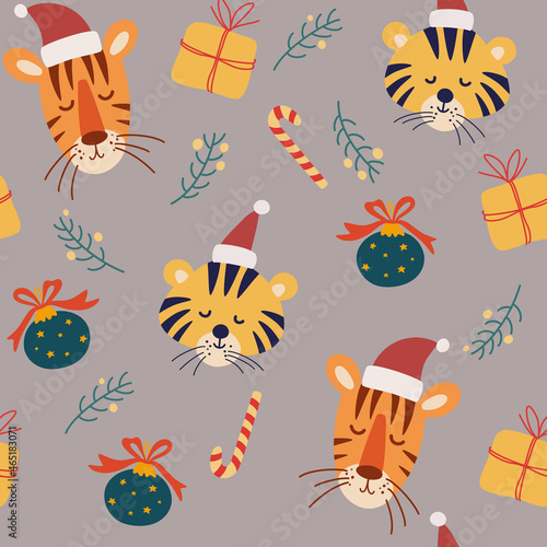 Tiger Cubs Muzzles Christmas seamless pattern. Gifts, Christmas tree, toys and twigs. Vector illustration for decor, textile, wallpaper, print and New Years design