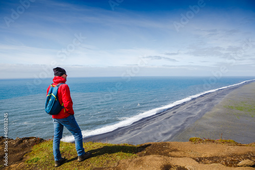 Traveler on the icelandic tour, traveling across iceland discovering natural destinations