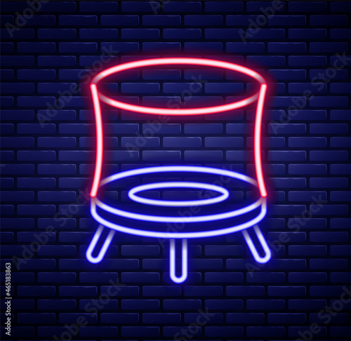 Glowing neon line Jumping trampoline icon isolated on brick wall background. Colorful outline concept. Vector
