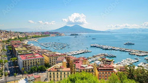 Naples, Italy. August 31, 2021. Time lapse video. View of the Gulf of Naples from the Posillipo hill with Mount Vesuvius far in the background with boats coming and going from the marina. photo
