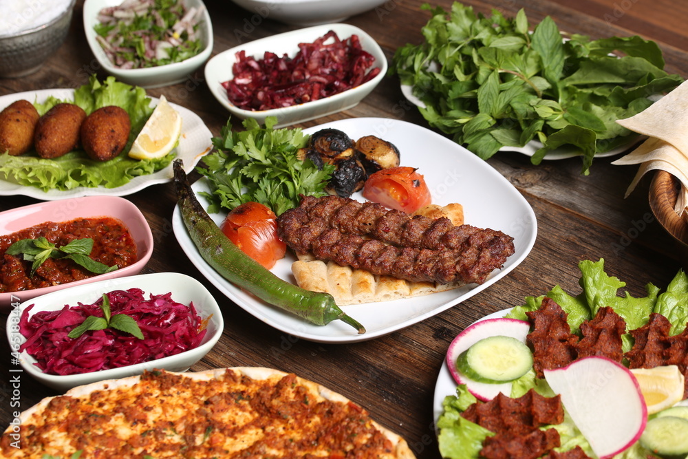 adana kebab and salad varieties adana kebab and salad varieties