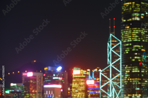 blur city view in hongkong at victoria harbour on night day