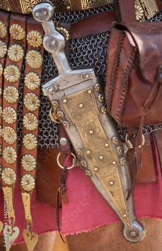 Slika na platnu Centurion girding a pugio, a dagger used by roman soldiers as a sidearm