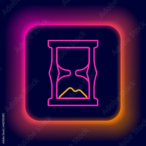 Glowing neon line Old hourglass with flowing sand icon isolated on black background. Sand clock sign. Business and time management concept. Colorful outline concept. Vector
