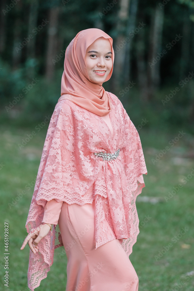 Portrait of Muslim beauty woman wearing hijab.
