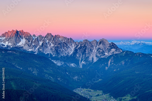 Idyllic shot of rock formations against clear sky during winter season photo