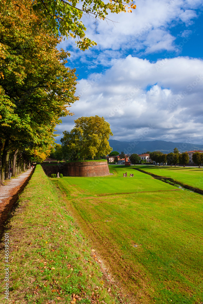 Travel in Tuscany. The Walls of Lucca public park with St Salvador Bulwark